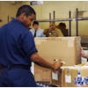 Shipping Clerk packaging items 