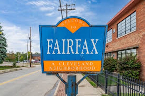 Blue and yellow sign with FAIRFAX written on it 