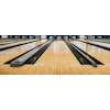 Multiple bowling lanes with the floor shining bright
